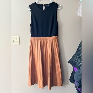 Marc New York sz M black and tan fit and flare dress with faux leather skirt.